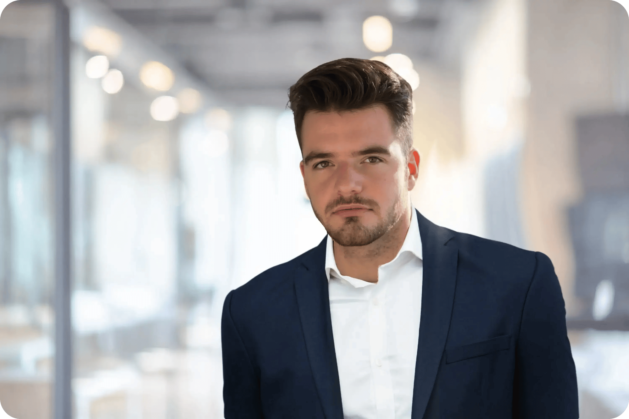 Insurance Agent Rich Kalosky inside of an office building with a blurry background